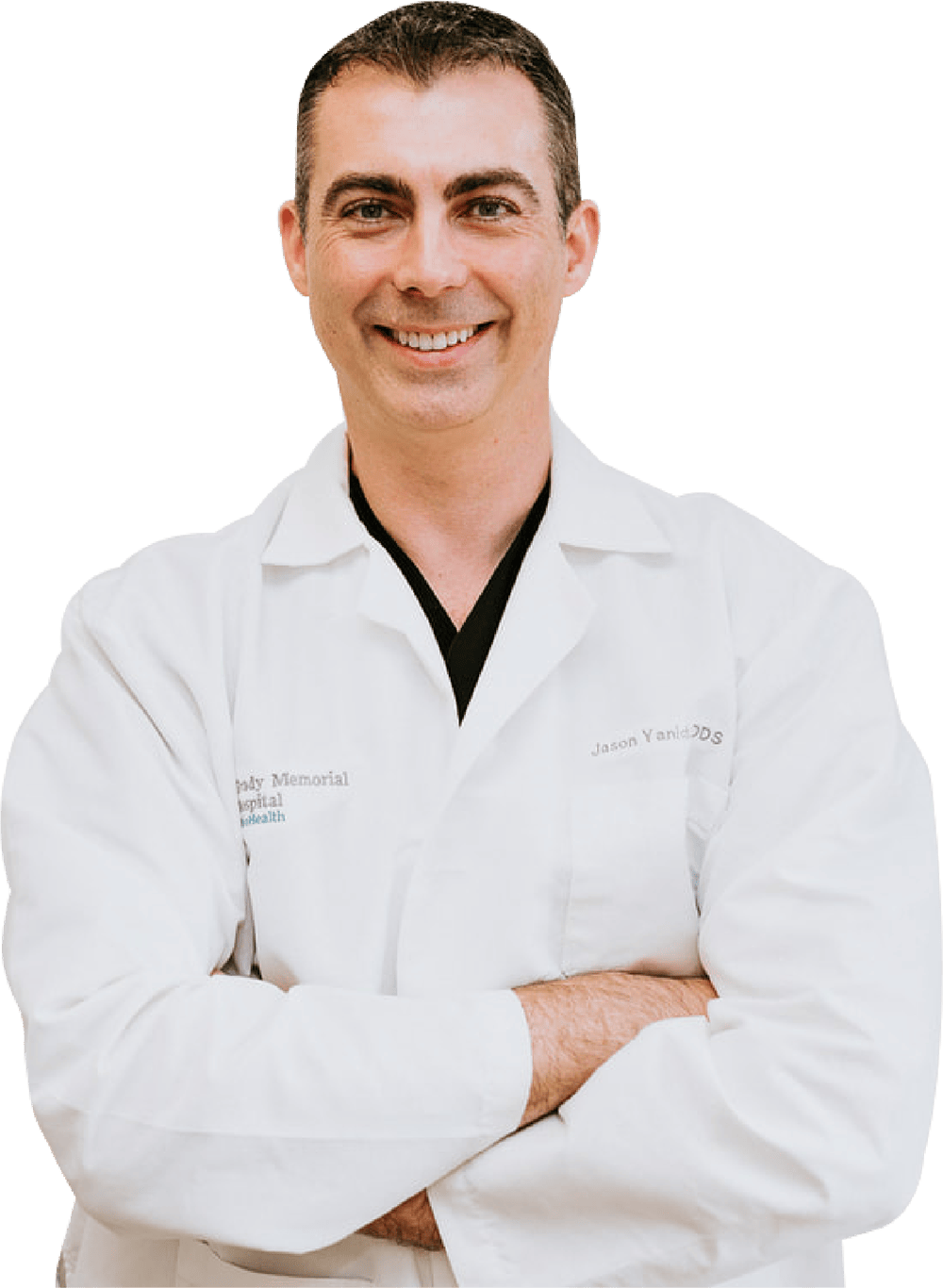 Dr. Yanich, expert oral surgeon in Marion, OH in white lab coat with arms crossed on transparent background