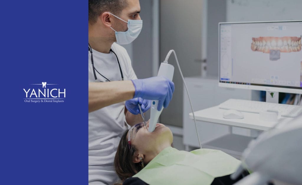 Dr. Yanich performing a dental procedure on a patient.